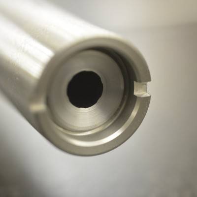 Recessed hunter style crown on removable thread protector